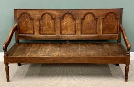 OAK OPEN HALL BENCH / SETTLE, circa 1840, the back having five crossbanded arched top panels, open
