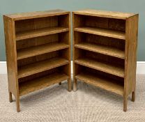 A PAIR OF OAK BACKED OPEN BOOKCASES early 20th Century, with shaped lower detail to the sides, 89cms
