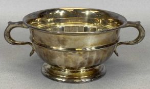 TWO HANDLED PEDESTAL BOWL IN ORIGINAL FITTED CASE, BIRMINGHAM 1936, I S GREENBERG & CO., having a