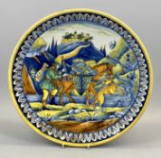 SPANISH MAIOLICA CIRCULAR CHARGER, 20th Century, painted with a figure, mule and dog, with a
