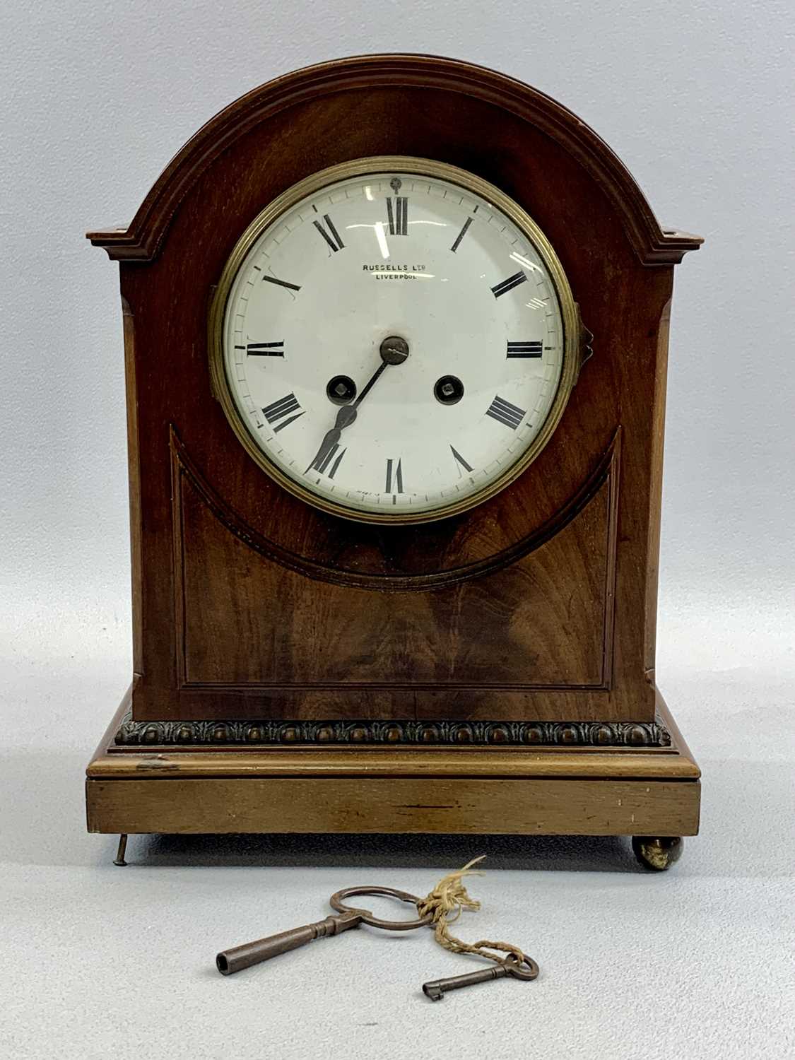 FRENCH MAHOGANY CASED DOME TOP MANTEL CLOCK, convex white enamel dial with...