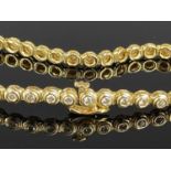 18CT GOLD DIAMOND SET TENNIS BRACELET, having 38 0.05-0.06ct diamonds, estimated total 2cts, stamp