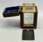 W THORNHILL & CO. GILT BRASS CASED CARRIAGE CLOCK with enamel dial, signed with Roman numerals, with