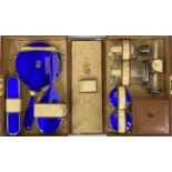 TRAVELLING VANITY CASE WITH SILVER & COBALT BLUE GUILLOCHE ENAMEL CONTENTS, BIRMINGHAM 1928, to