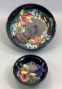 MOORCROFT CIRCULAR BOWL, 'Orchid and Iris' pattern on a blue ground, impressed marks and
