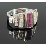 14CT WHITE GOLD PINK SAPPHIRE & DIAMOND SET DRESS RING, central faceted emerald cut pink sapphire,