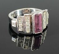 14CT WHITE GOLD PINK SAPPHIRE & DIAMOND SET DRESS RING, central faceted emerald cut pink sapphire,