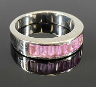 PINK SAPPHIRE SET DRESS RING, UNMARKED & UNTESTED, POSSIBLY WHITE GOLD, having 9 inline faceted