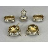 VICTORIAN TABLE CONDIMENTS GROUP, to include a pair of circular salts, London 1869, Robert Harper,