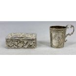 VICTORIAN & LATER EMBOSSED SILVER TRINKETS x 2, comprising small scroll handled tankard, London