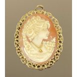 18CT GOLD SHELL CARVED CAMEO BROOCH WITH HANGING LOOP, the carving depicting head and shoulders of a