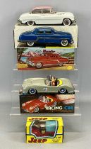 BOXED TINPLATE TOY CARS, 1950s Buick standard Sedan friction drive, white with pink roof and