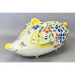 LARGE ARTHUR WOOD PIGGY BANK IN THE FORM OF WHIMSICAL PIG, with blue, pink and yellow floral