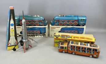 CHINESE MF804 FRICTION DRIVE TINPLATE INTERNATIONAL EXPRESS LOCOMOTIVES x 2, a Shri Ganesha tinplate