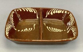 SLIPWARE DOUBLE-SIDED BAKING TRAY, PROBABLY WELSH, 19th Century, of oval form with brown glaze and