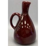 POSSIBLY DUTCH SANG DE BOEUF JUG, signed 'Zeni Oyda A9' on base, 22cms H