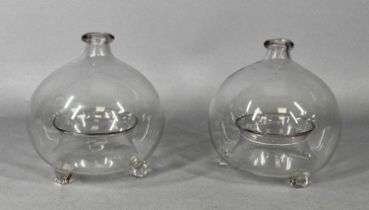 VICTORIAN BLOWN GLASS FLY CATCHERS x 2, each of circular form and standing on three feet, 16cms H (