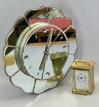 VINTAGE MAGNETA WALL CLOCK with floral design mirrored surround, 43cms diam., and a Weiss gilt metal