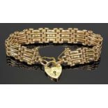 VINTAGE 9CT GOLD PART TEXTURED LINK BRACELET WITH PADLOCK CLASP & SAFETY CHAIN, circa 1900, 17.