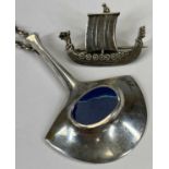 NORWEGIAN JEWELLERY IN SILVER & ENAMEL to include a stylised silver and blue enamel pendant