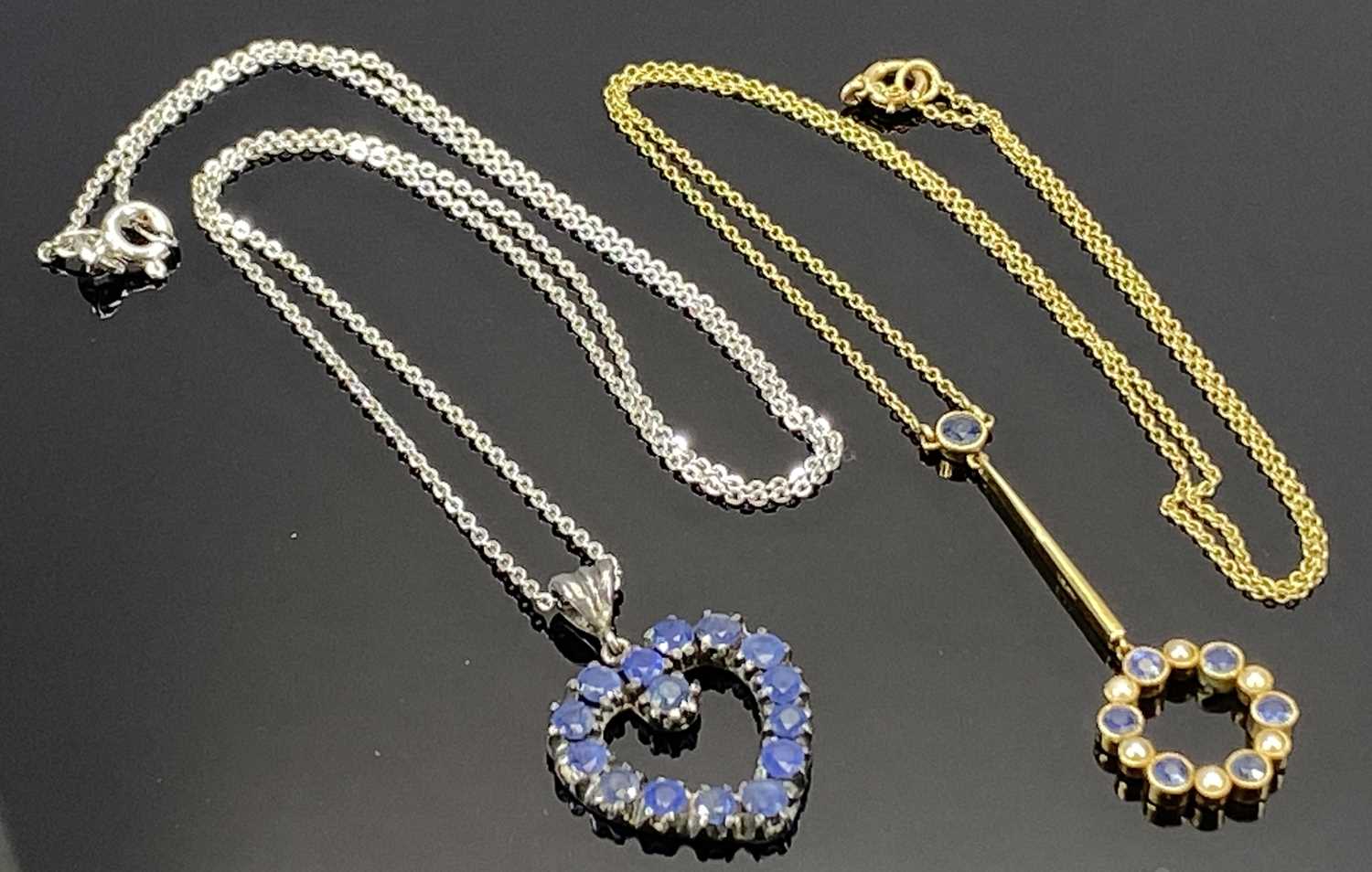TWO BLUE SAPPHIRE SET NECKLACES the first being in 15ct yellow gold, the fine link necklace with - Image 3 of 3