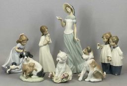 NAO PORCELAIN MODELS including figurines, 29.5cms (the tallest), and two Lladro puppies, 13cms H (