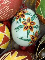 A COLLECTION OF UKRAINIAN HAND PAINTED EGG BAUBLES all boxed (approx 44)