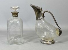 SILVER COLLARED CUT GLASS DECANTER WITH STOPPER & A NOVELTY CLARET JUG WITH PLATED MOUNTS, the