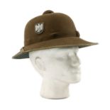 THE MILITARY CLUB HOUSE: AFRIKA KORPS PITH HELMET of green-brown felt outer, affixed with National