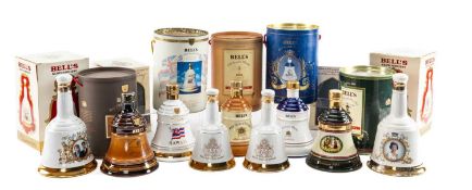 THE WHISKY CLUB HOUSE: NINE BELL'S COMMEMORATIVE DECANTERS comprising one of each as follows;