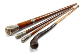 THE MILITARY CLUB HOUSE: GROUP OF SWAGGER STICKS including WW1 period silver-mounted malacca swagger