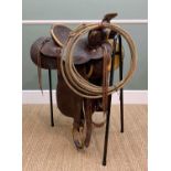 THE EQUESTRIAN CLUB HOUSE: WESTERN LEATHER SADDLE, by A.V. Vost, c.1940, 67cms long Provenance: