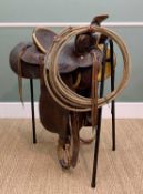 THE EQUESTRIAN CLUB HOUSE: WESTERN LEATHER SADDLE, by A.V. Vost, c.1940, 67cms long Provenance: