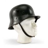 THE MILITARY CLUB HOUSE: WORLD WAR II GERMAN HELMET size 58 as per leather interior, leather chin-