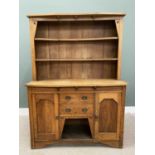 ARTS & CRAFTS OAK DRESSER, having a shaped corbel overhang to the top to a boarded back two-shelf