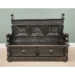 ANTIQUE STAINED OAK JACOBEAN-STYLE BOX SEAT HALL BENCH, with carved lion arms, tavern interior