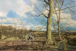 ‡ TONY WOODING (British) oil on canvas - early spring view of a farmer in a tractor ploughing a