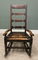 ANTIQUE FARMHOUSE LADDER BACK ROCKING CHAIR, having low swept arms on short turned supports, solid