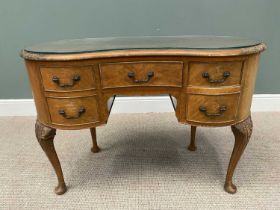 VINTAGE WALNUT KIDNEY SHAPED DRESSING TABLE / DESK, protective glass top and part carved detail to