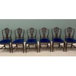 SET OF SIX REGENCY-STYLE MAHOGANY SHIELD BACK DINING CHAIRS, central pierced carved splat with