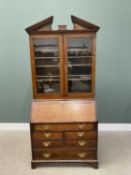 GEORGIAN PERIOD OAK BUREAU BOOKCASEcirca 1800, having a broken architectural pediment over twin