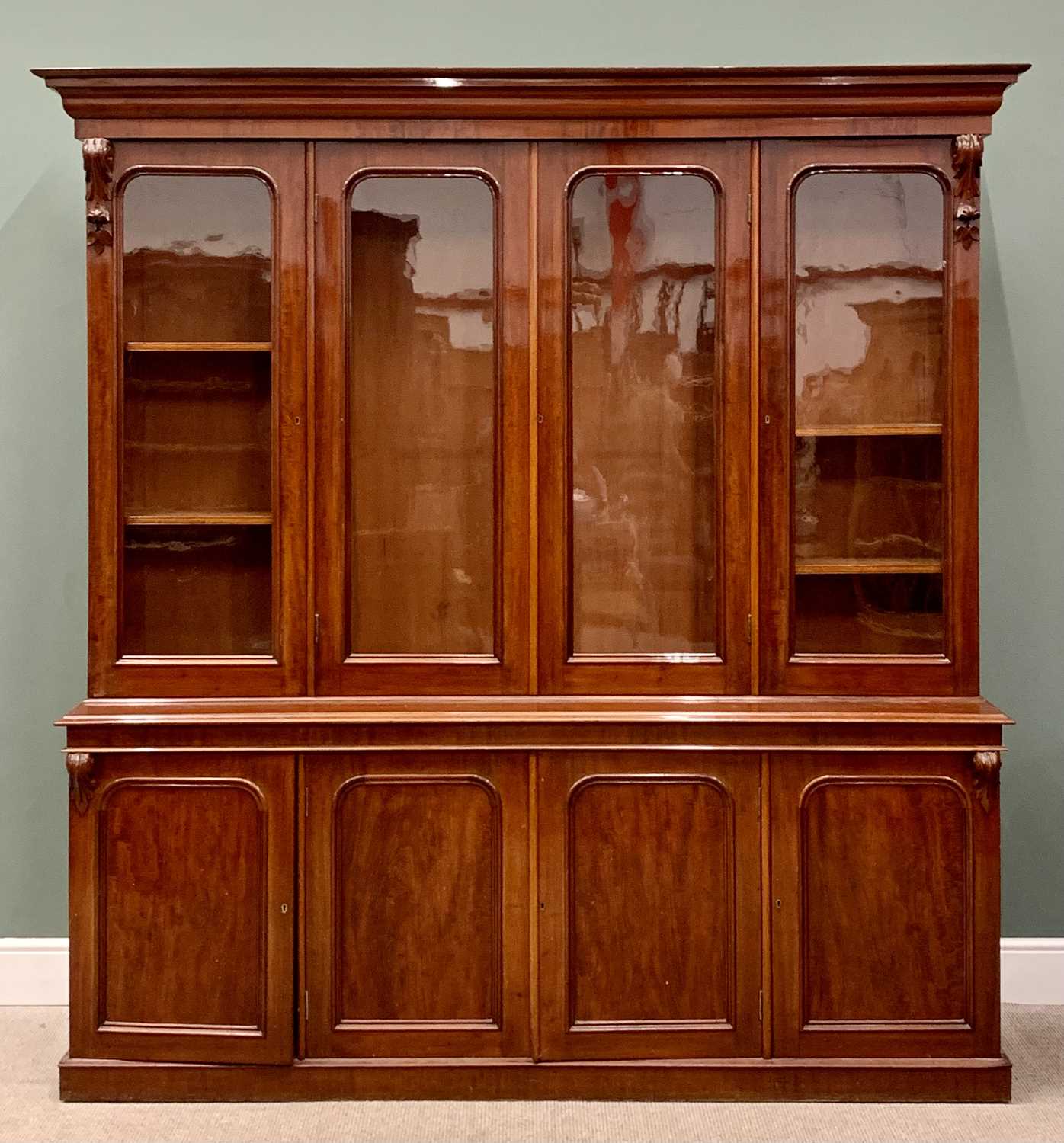 VICTORIAN MAHOGANY FOUR-DOOR BOOKCASE CUPBOARD, extremely well presented, having a stepped cornice