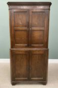 ANTIQUE OAK TWO-PIECE FLOORSTANDING CORNER CUPBOARD, having twin two-panel upper doors with interior