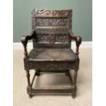 18TH CENTURY CARVED OAK ELBOW CHAIR, peg joined construction with chip carving to the back, panels