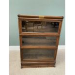 OAK -PROBABLY GLOBE WERNICKE-THREE-SECTION STACKING BOOKCASE, with top cover and single drawer base,