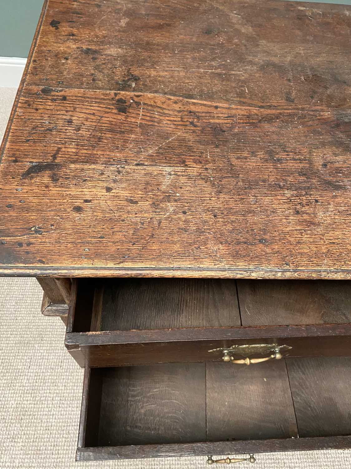 GEORGIAN OAK CHEST of four long crossbanded oak lined drawers, with later brassware, panel sided - Image 2 of 4