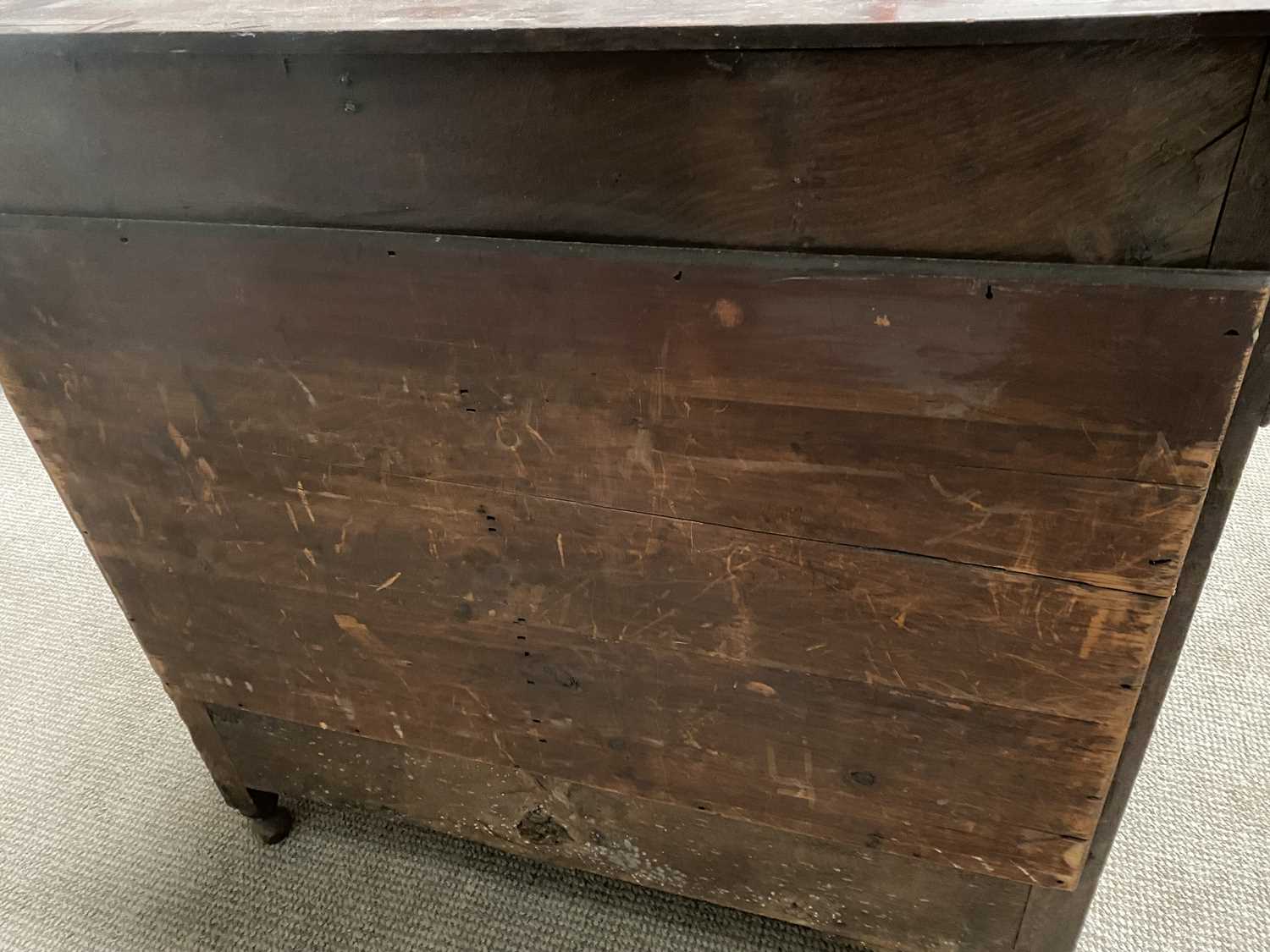 GEORGIAN OAK CHEST of four long crossbanded oak lined drawers, with later brassware, panel sided - Image 4 of 4