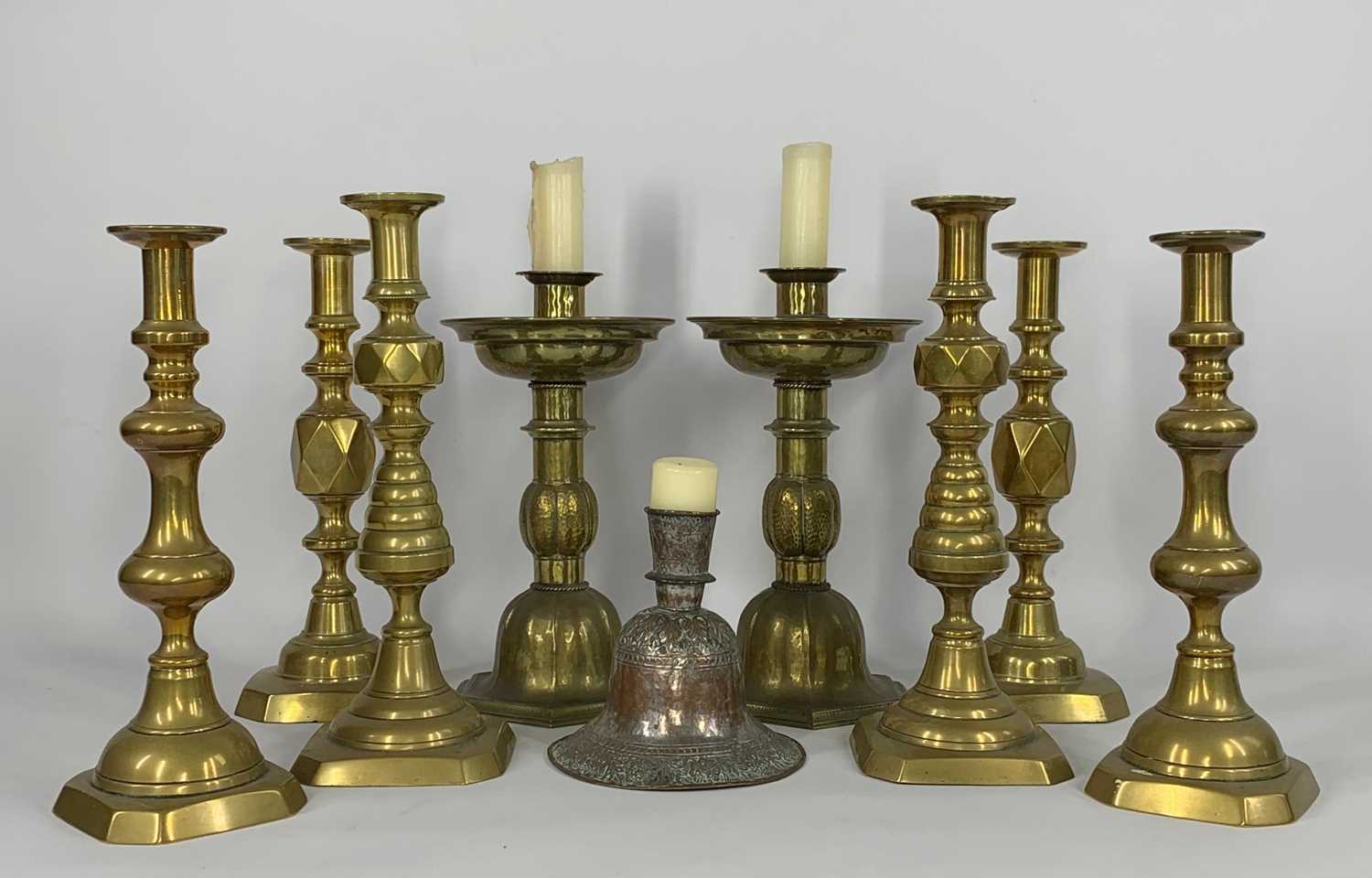 ANTIQUE BRASS CANDLESTICKS comprising pair of beehive candlesticks, 33cms high, pair of King of