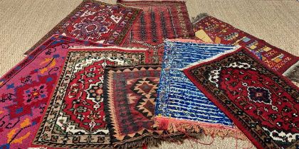 ASSORTED SMALL RUGS & MATS, including a Persian prayer mat, largest rug 135 x 66cms, smallest 67 x