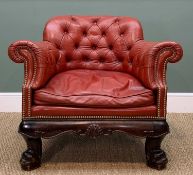 VICTORIAN LEATHER BERGERE, red button upholstery, studded arms, border and back, stained hardwood